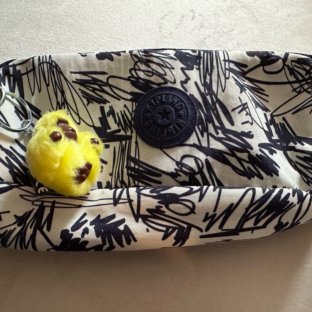 Kipling Scribble Print Pouch with Yellow Charm